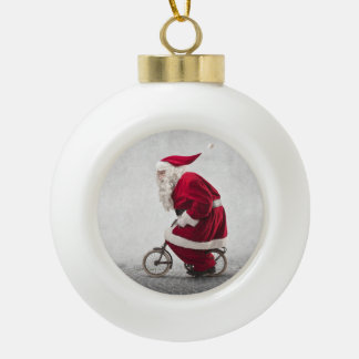 Boule En Céramique Le père noël monte une bicyclette