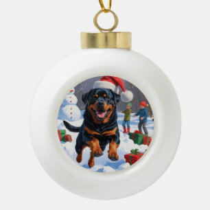 Boule En Céramique Rottweiler courant dans la neige avec un chapeau d