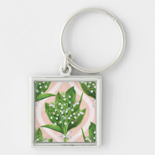 Bouquet of lilly of the valley flowers on green keychain