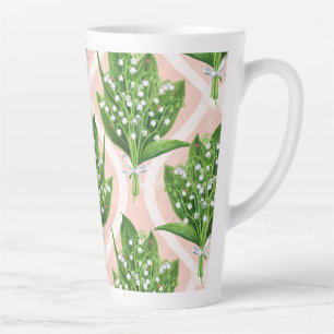 Bouquet of lilly of the valley flowers on green latte mug