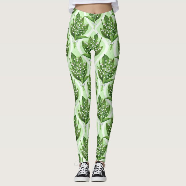 Bouquet of lilly of the valley flowers on green leggings (Front)