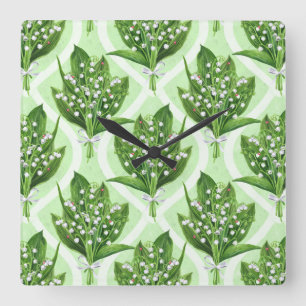 Bouquet of lilly of the valley flowers on green square wall clock