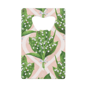 Bouquet of lilly of the valley flowers on pink credit card bottle opener