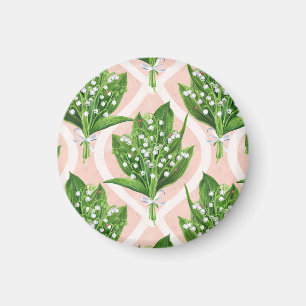 Bouquet of lilly of the valley flowers on pink magnet