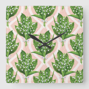 Bouquet of lilly of the valley flowers on pink square wall clock