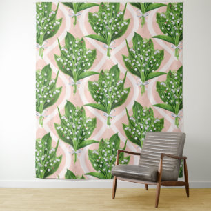 Bouquet of lilly of the valley flowers on pink tapestry