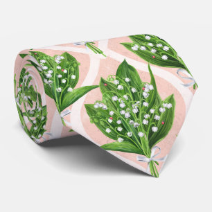 Bouquet of lilly of the valley flowers on pink tie