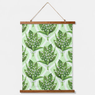 Bouquet of lily of the valley flowers on blue hanging tapestry