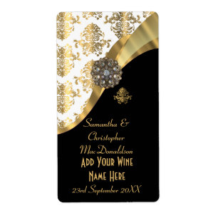 Bouteille blanche, noire et d'or de mariage