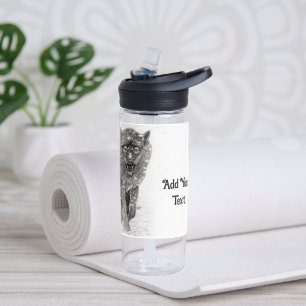 Bouteille D'eau Loup noir en colère dans la neige, hiver sauvage