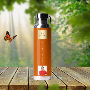 Bouteille D'eau Nom du logo de l'entreprise photo brûlée orange