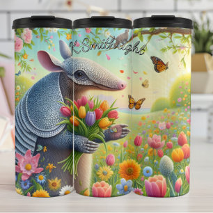 Bouteilles Isothermes Armadillo dans un jardin fleuri