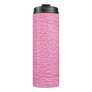 Bouteilles Isothermes Cuir rose gros plan, arrière - plan texturé.