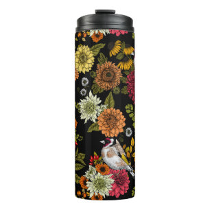 Bouteilles Isothermes Goldfinches dans le jardin sur noir