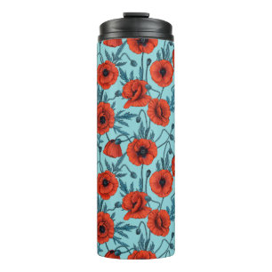Bouteilles Isothermes Poppies, rouge et bleu sur le bleu de la piscine