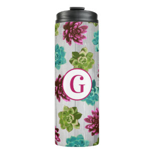 Bouteilles Isothermes Succulents colorés tendance et planches en bois ru