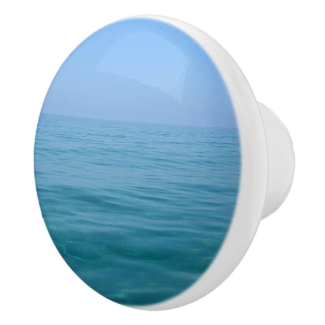 Bouton bleu simple de raboteuse de mer et de ciel (Droite)