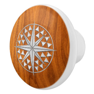 Bouton De Porte En Céramique Boussole de chrome sur la copie en bois de grain