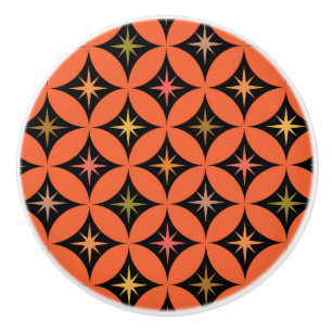Bouton De Porte En Céramique Mi-siècle étoiles atomiques sur les cercles orange