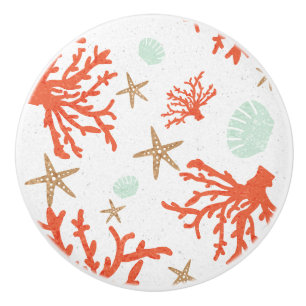 Bouton De Porte En Céramique Orange de récif coralien et de plage de coquilles