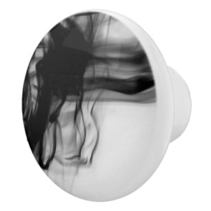 Bouton en céramique du feu II noir par l'artiste