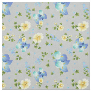Boutons d'or jaunes et tissu d'Iris bleus