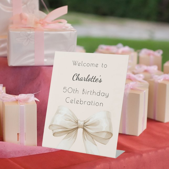 Bow cream beige birthday party welcome pedestal sign (Creator Uploaded)