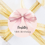 Bow pink Birthday Classic Round Sticker<br><div class="desc">A blush pink coloured background. Decorated with a large bow.  Personalize and add a name. Black handwritten style script.</div>