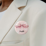 Bow pink name tag 2 inch round button<br><div class="desc">A soft blush pink coloured background. Decorated with a large bow.  Personalize and add your name.   Black handwritten style script.</div>
