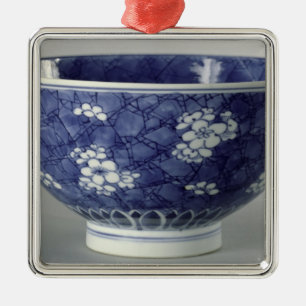 Bowl decorated with cherry blossom metal ornament