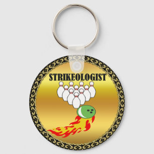 Bowling pins and ball with the word STRIKEOLOGIST Keychain