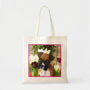 Boxer puppy in tulips tote bag