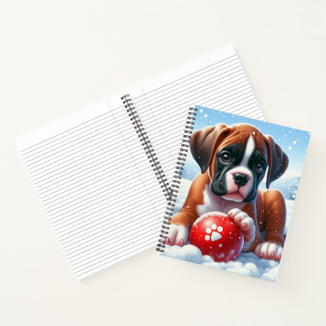 Boxer Puppy Playing With a Red Ball in a Winter Notebook (Inside)