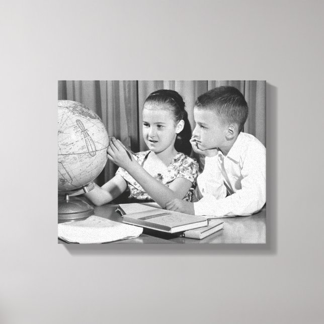 Boy and Girl Viewing Globe Canvas Print (Front)