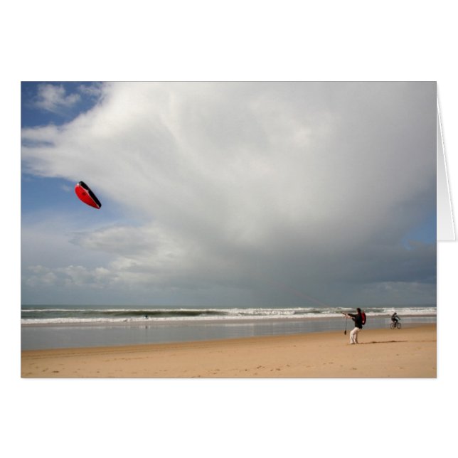 Boy at the beach kitesurfing (Front Horizontal)