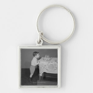 Boy Blowing Out Candles Keychain