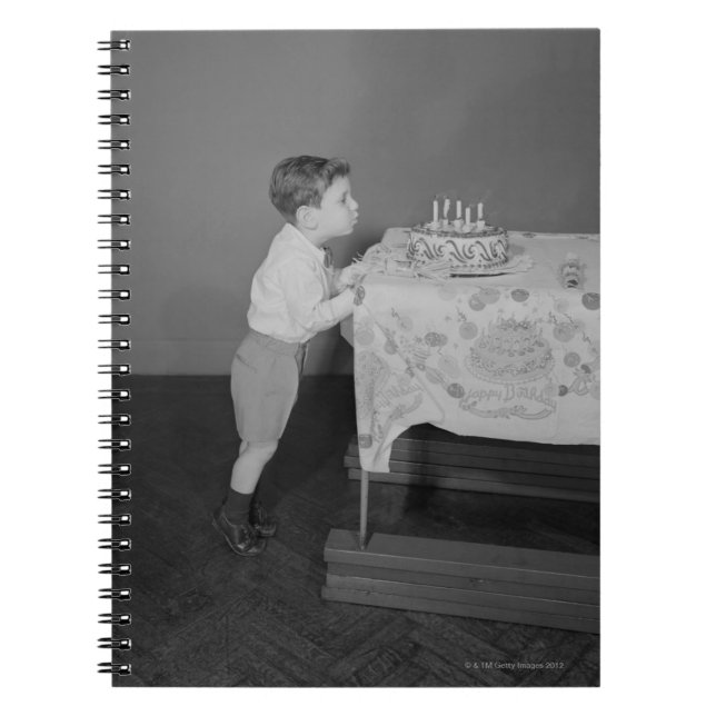 Boy Blowing Out Candles Notebook (Front)