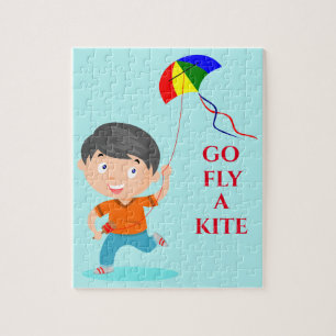 Boy flying kite puzzle. jigsaw puzzle