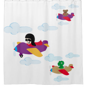 Boy, funny bear and dino flying by planes