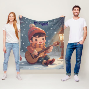 boy playing guitar Christmas Fleece Blanket