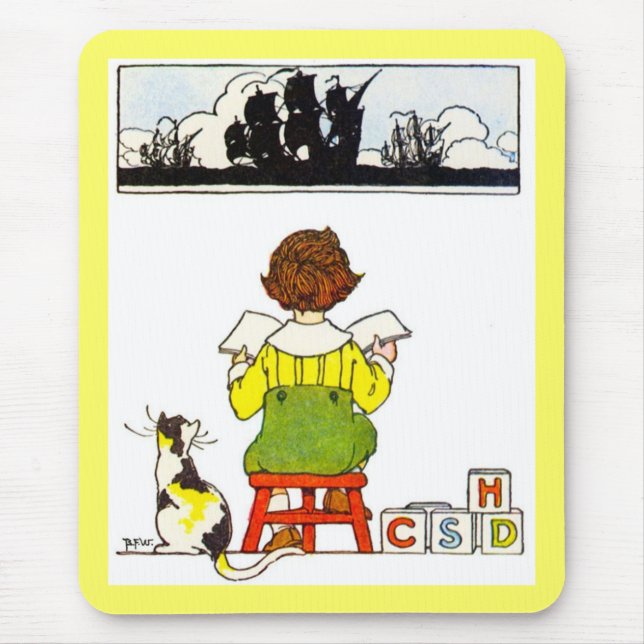 Boy reading mouse pad (Front)