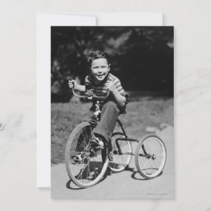 Boy Riding Tricycle