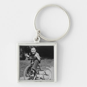 Boy Riding Tricycle Keychain