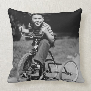 Boy Riding Tricycle Throw Pillow