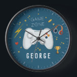 Boys Cool Video Game Controller Kids Gaming Clock<br><div class="desc">This cool blue custom kids and teens clock design features a blue cartoon video game design, with a controller, headset, game coins, health heart, lightening bolt, ‘game zone’, stars, and trophy. There is also space for you to add your boys name in a modern font. The perfect kids room decor...</div>