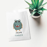 Boys Cute Blue Monster Kids Birthday Party Favour Bag<br><div class="desc">This cute,  fun and modern kids birthday party favour bag design features a blue monster alien,  and can be personalized with your child’s name. The perfect addition to your child’s third birthday party (can be edited for any age).</div>