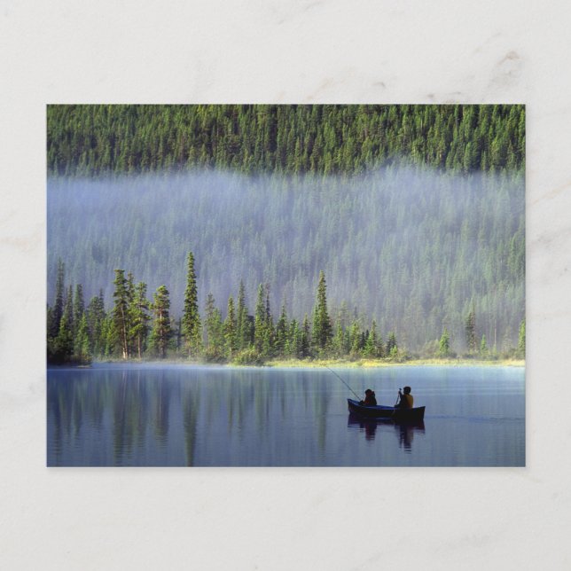Boys fishing from canoe with mist in postcard (Front)