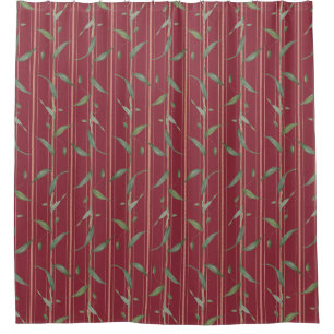 Branch of leaves on red wallpaper