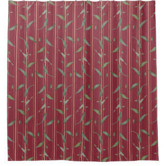 Branch of leaves on red wallpaper