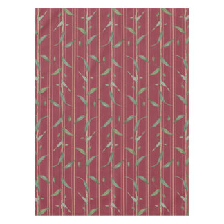 Branch of leaves on red wallpaper tablecloth